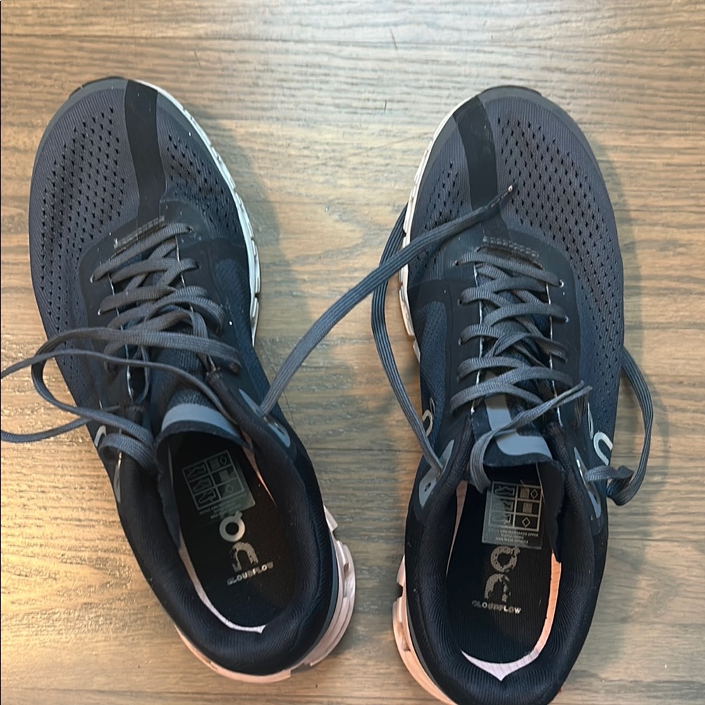 On Running Black Athletic Shoes with Breathable Mesh and Cushioned Collar